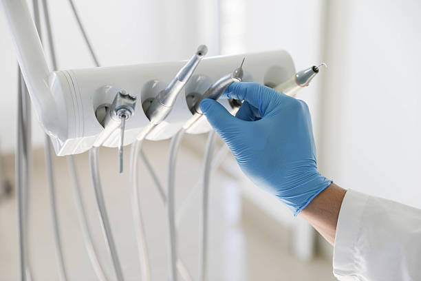 Professional Tooth Extraction technician working in McLoud, OK